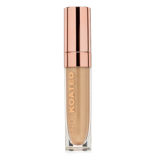 A closed clear and rose gold tube of Luster in “Cool Whip”, a pale gold with a metallic finish. The tube has Kandi Koated written up the side and a rose gold cap.